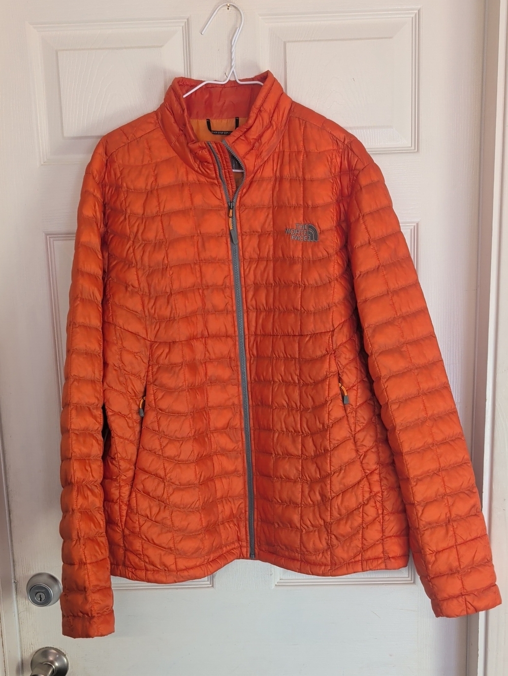 The North Face Orange Lightweight Puffer Jacket
